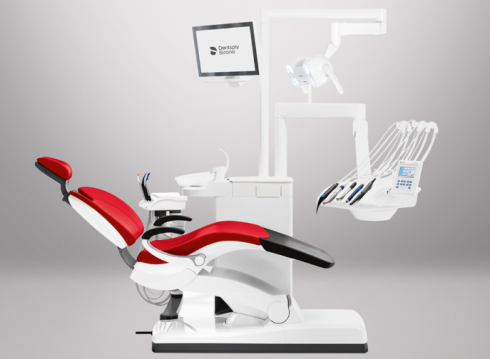 Poste de traitement Sirona Sinius rouge avec écran et scialytique